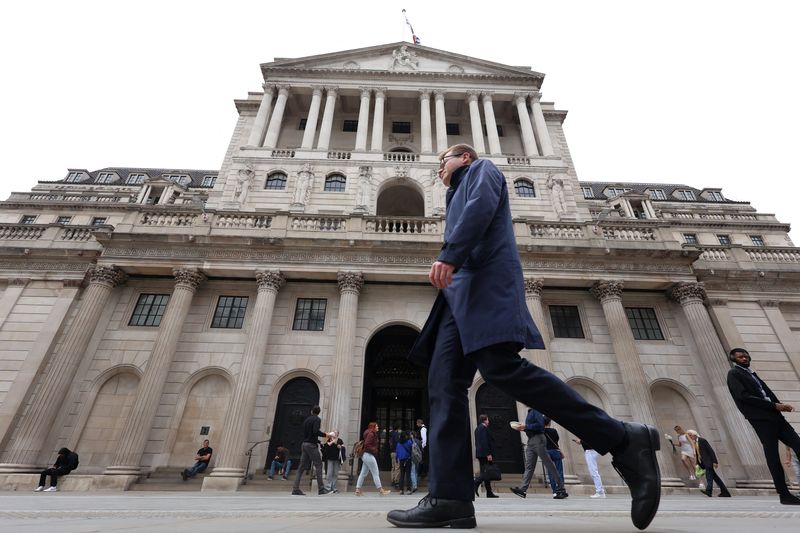 Bank of England cuts rates but sees higher inflation after Reeves's budget