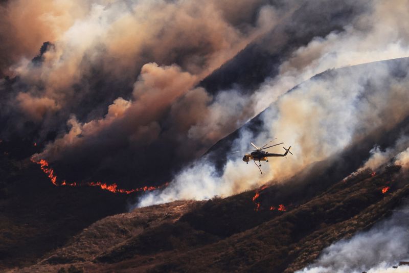 Firefighters gaining control over devastating wildfire near Los Angeles