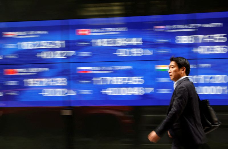 Asian stocks climb on Wall Street lead; yuan, euro sag