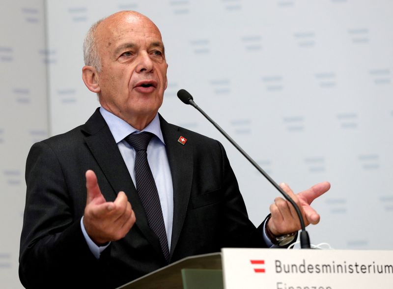 Former Swiss finance minister warns about size of enlarged UBS, newspaper says